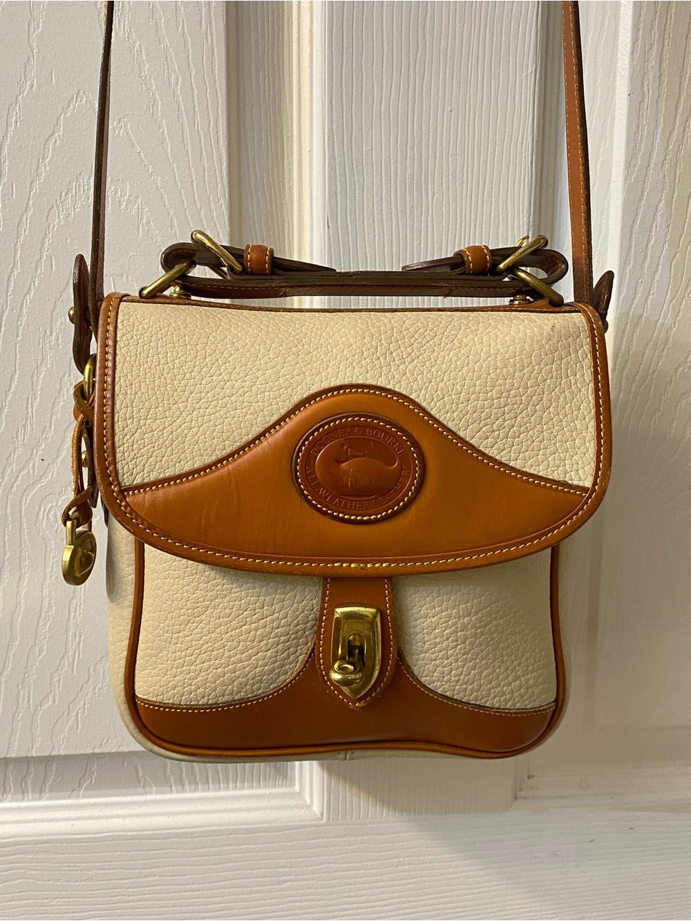 Dooney & Bourke all weather leather small crossbody bag great condition clean
